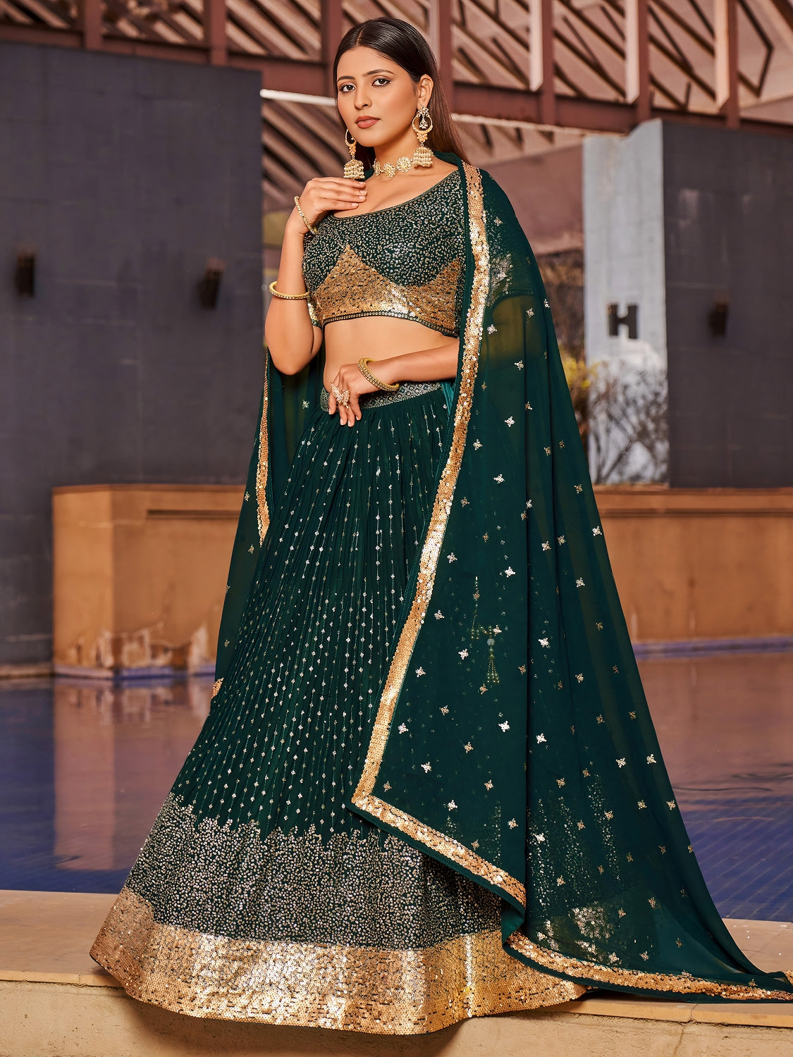 Emerald Green Georgette Lehenga Choli with Gold Sequin Work and Matching Dupatta