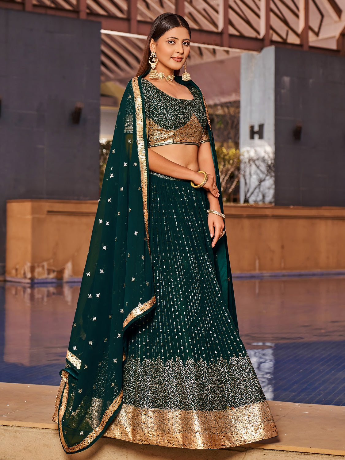 Emerald Green Georgette Lehenga Choli with Gold Sequin Work and Matching Dupatta