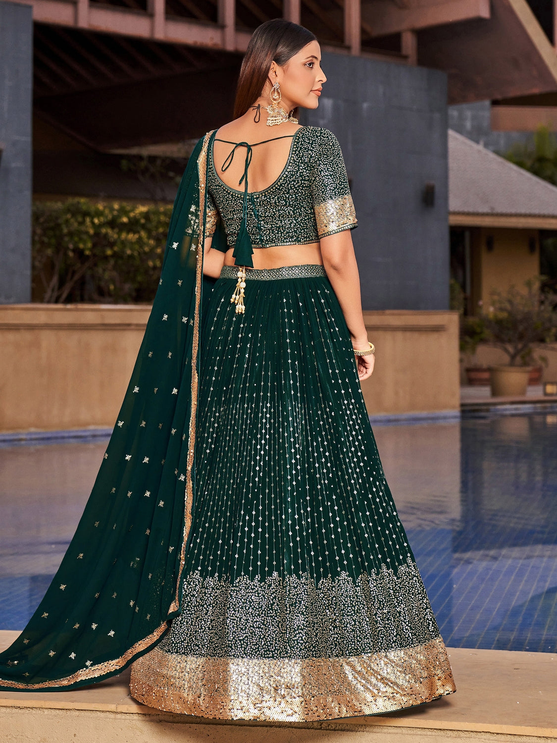 Emerald Green Georgette Lehenga Choli with Gold Sequin Work and Matching Dupatta