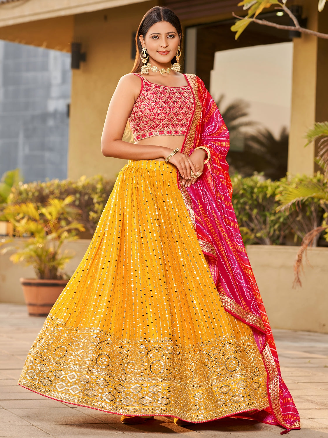 Mustard Yellow Georgette Lehenga Choli with Mirror Zari Work and Pink Bandhani Dupatta