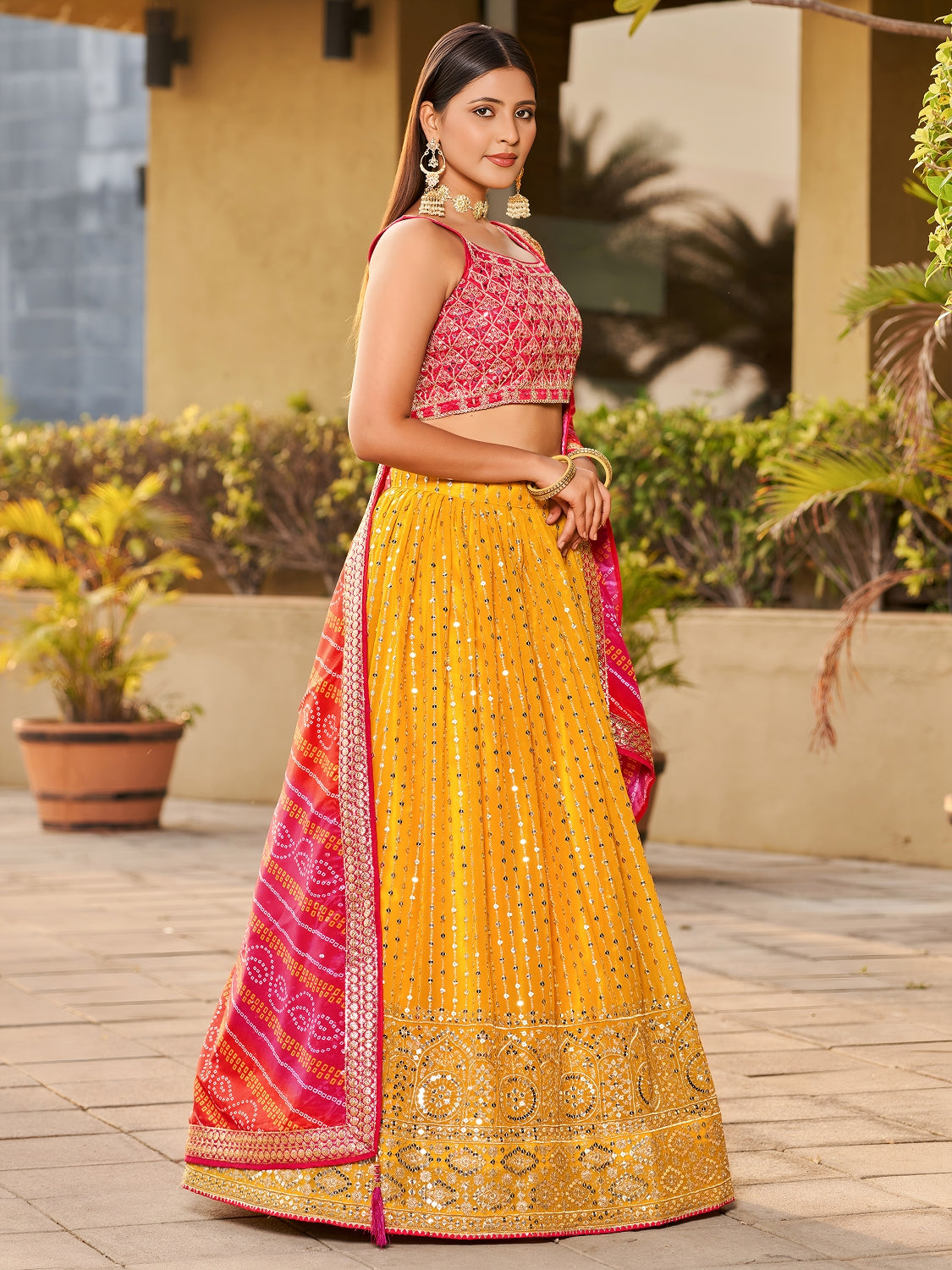 Mustard Yellow Georgette Lehenga Choli with Mirror Zari Work and Pink Bandhani Dupatta